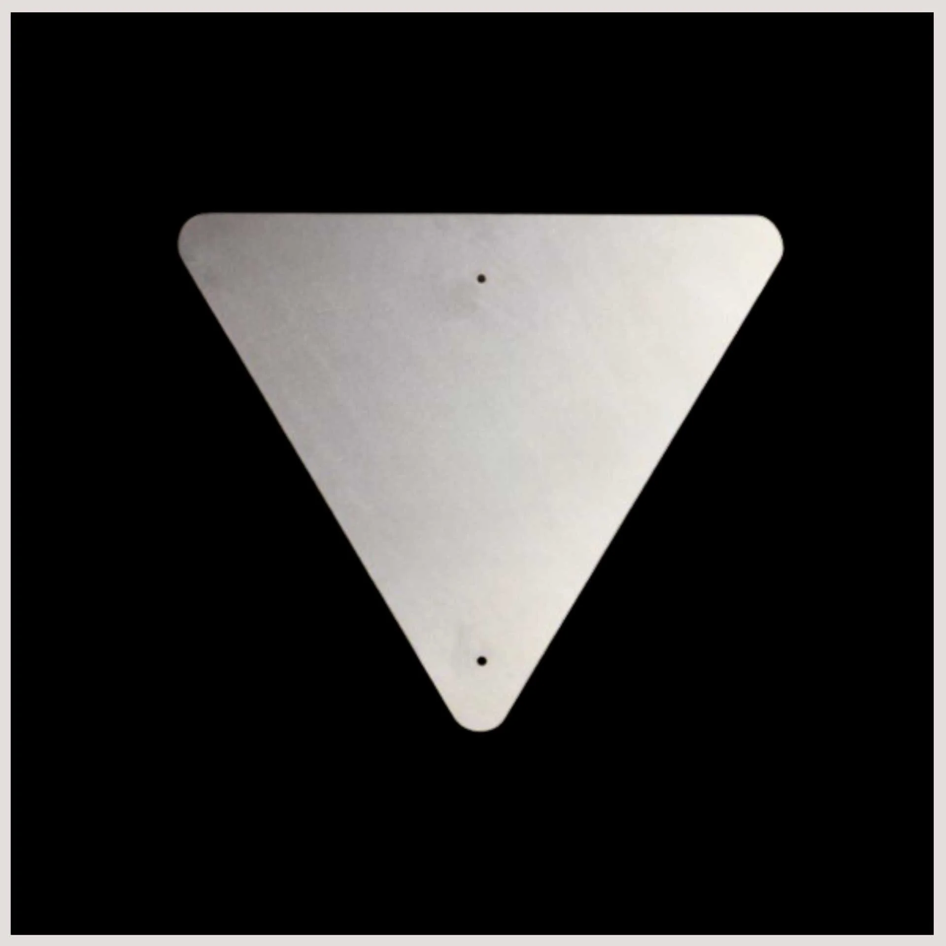 An empty triangular traffic sign is displayed, ready to be filled with essential messages for road users and drivers.