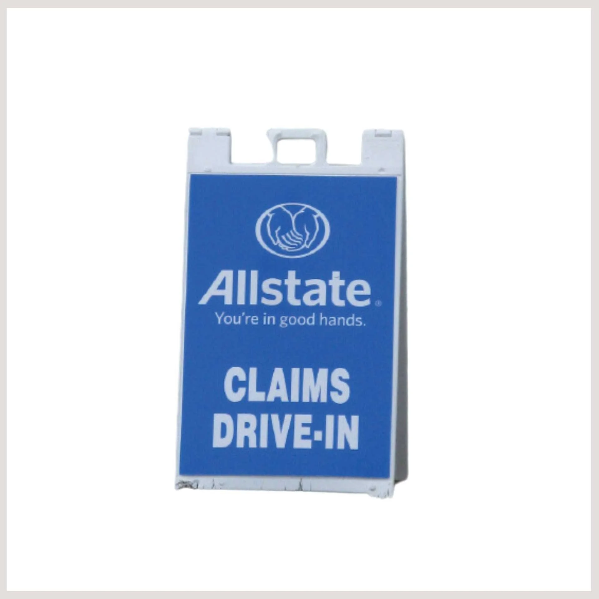 A clear view of an Allstate claims drive-in sign, prominently displayed to guide customers
