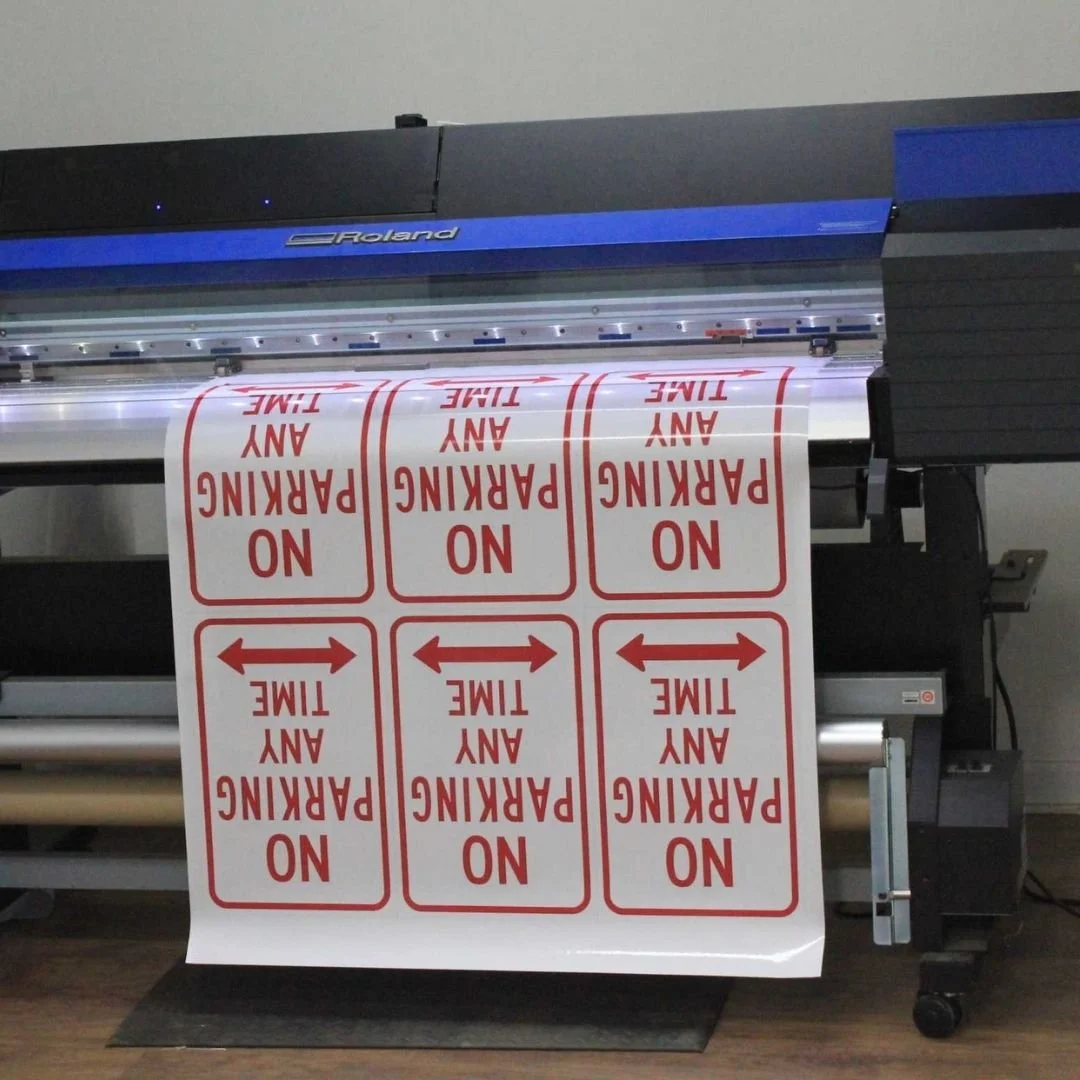 Image of glenco machine printing a sign in their sign shop