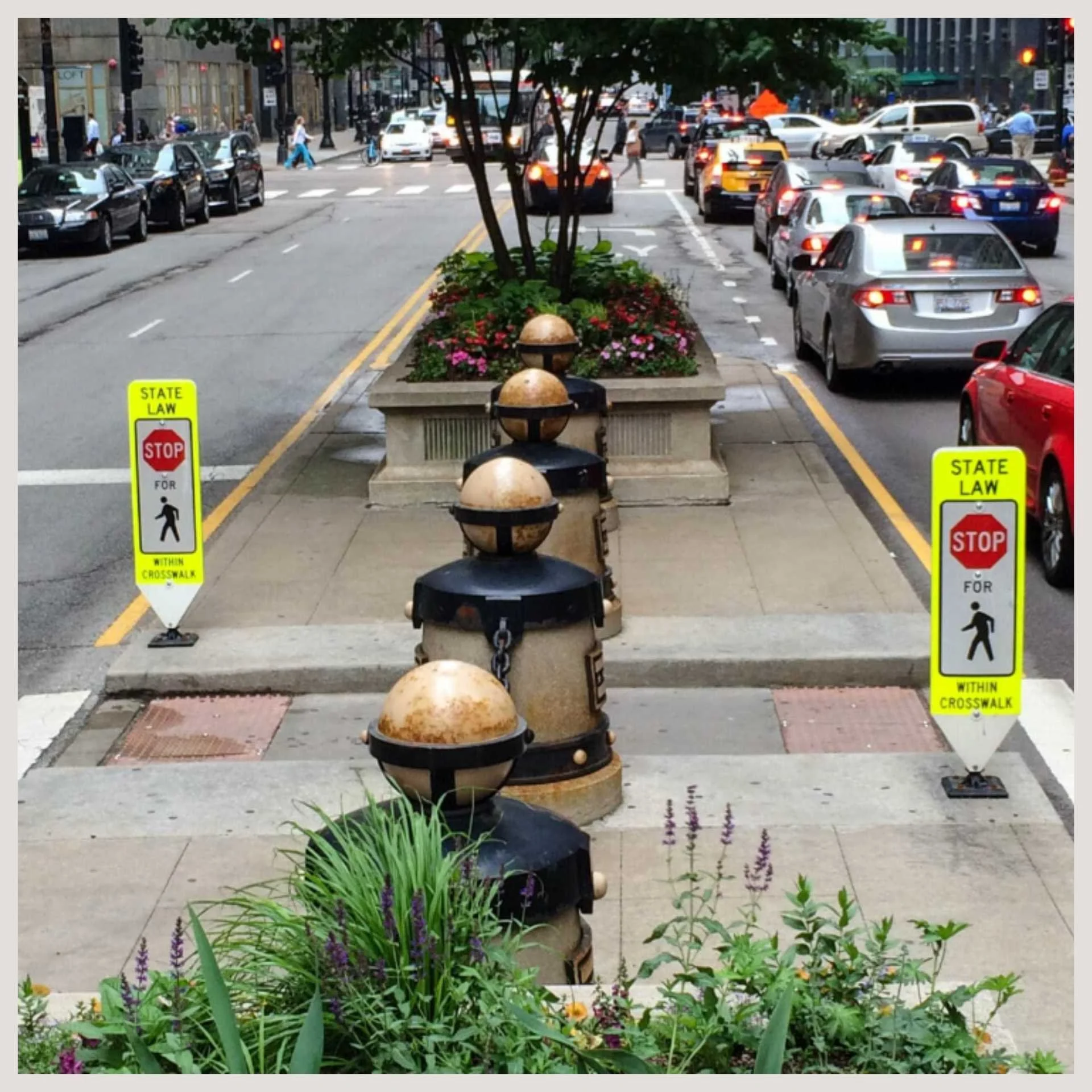 A bustling street scene with many cars, illustrating significant traffic flow and urban activity.