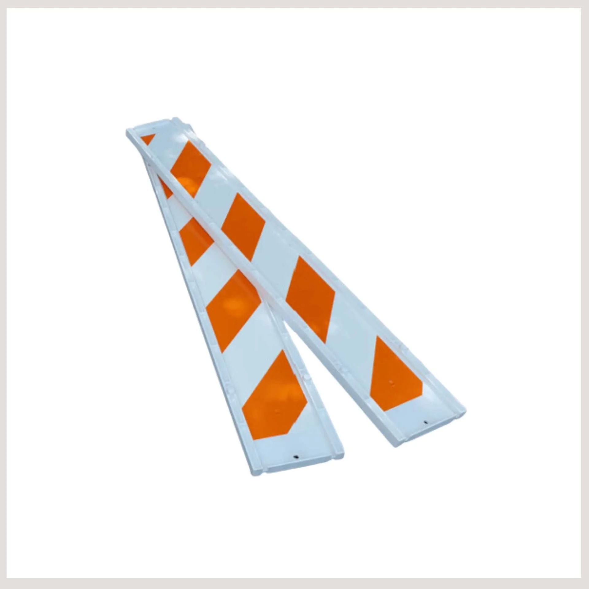 Two orange and white barricades laying together on a white background