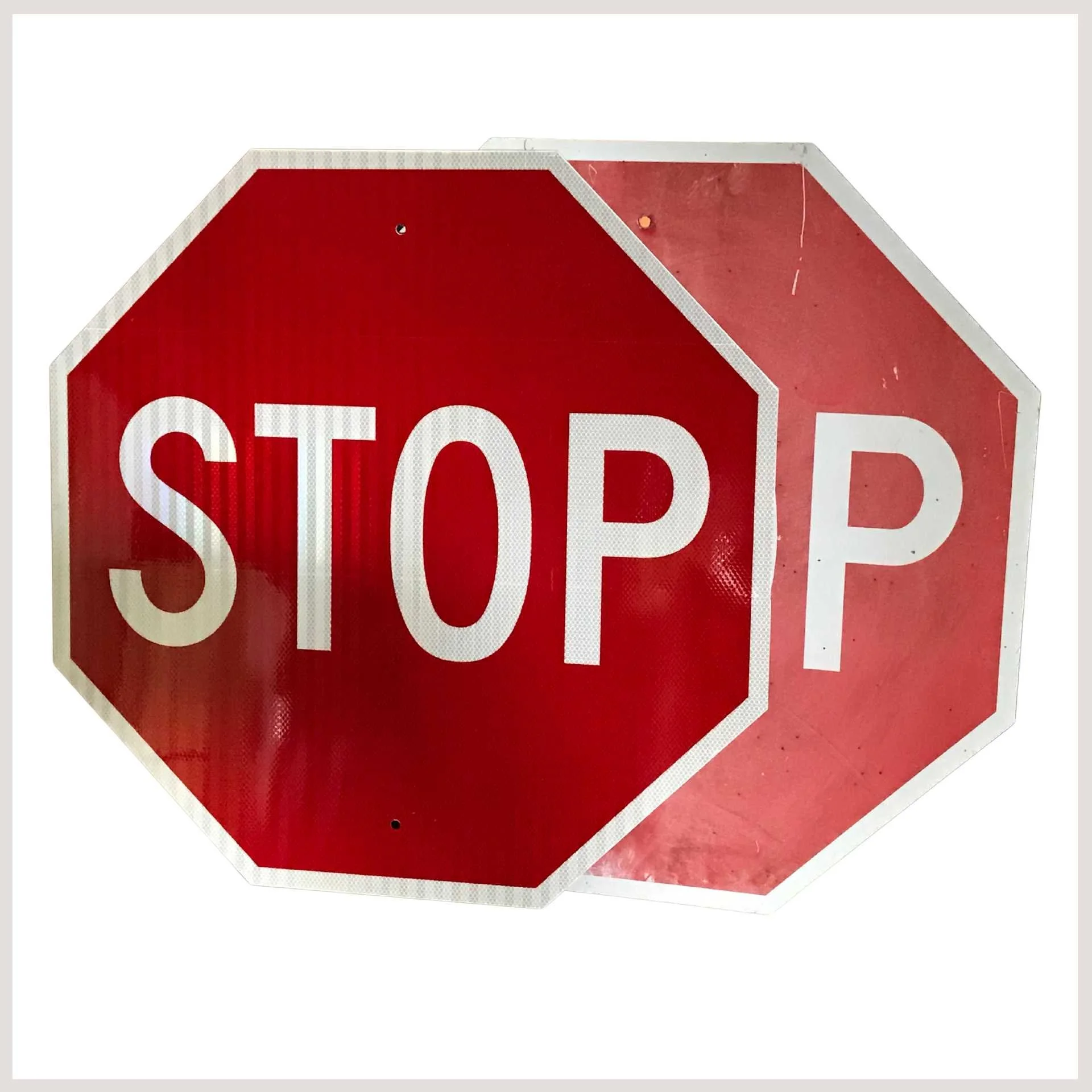 A stop sign prominently displayed against a clean white background