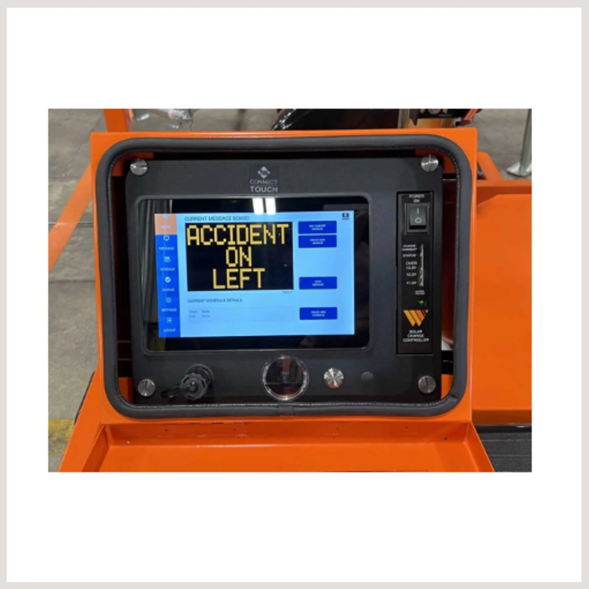 A machine displaying the word "accident on left" prominently on its surface, indicating a potential hazard